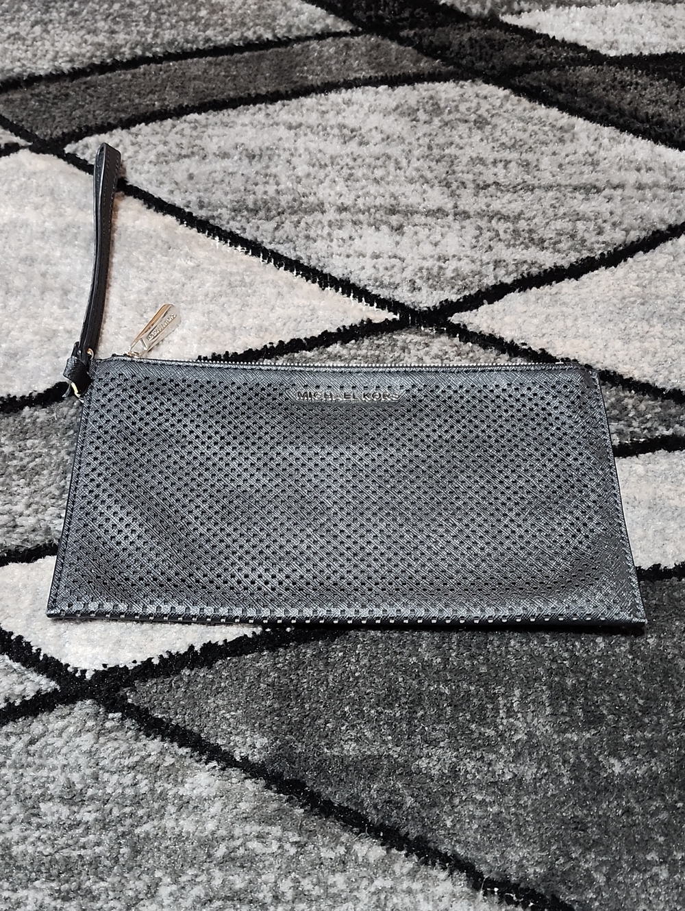 MICHAEL KORS BLACK PERFORATED GUSSET CLUTCH WRISTLET PRICE FIRM